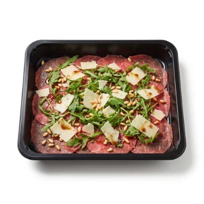 Rundscarpaccio van het huis met parmezaan en rucola · per persoon